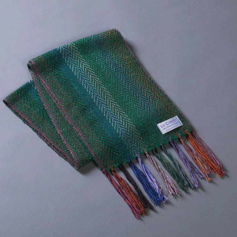 liz-christy-bragan-herringbone-scarf-glenveagh-green-folded