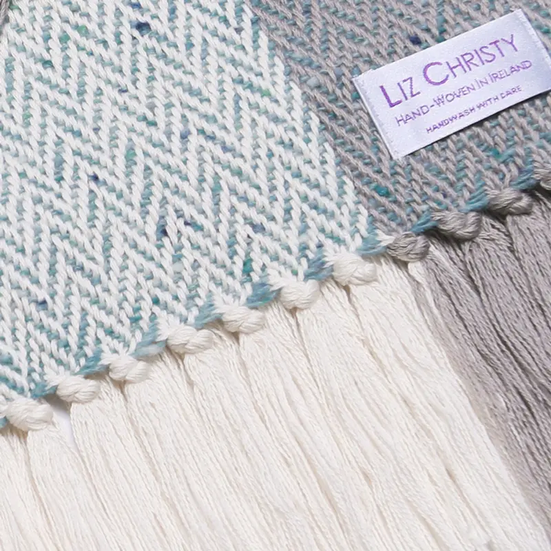 drumlin-wrap-ecru-grey-aqua