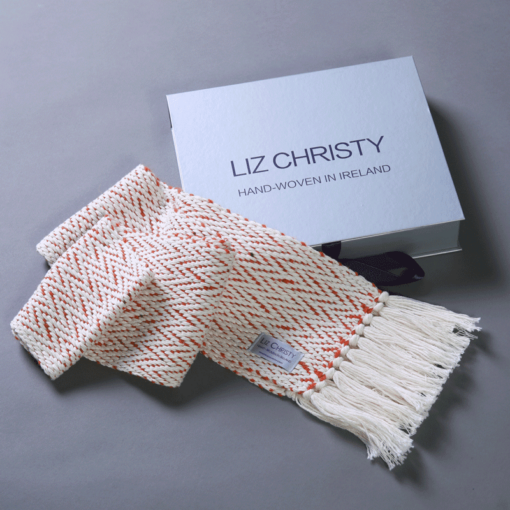 liz-christy-ancient-civilizations-herringbone-scarf-loughlin-orange