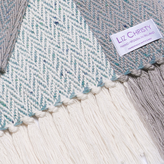 drumlin-wrap-ecru-grey-aqua